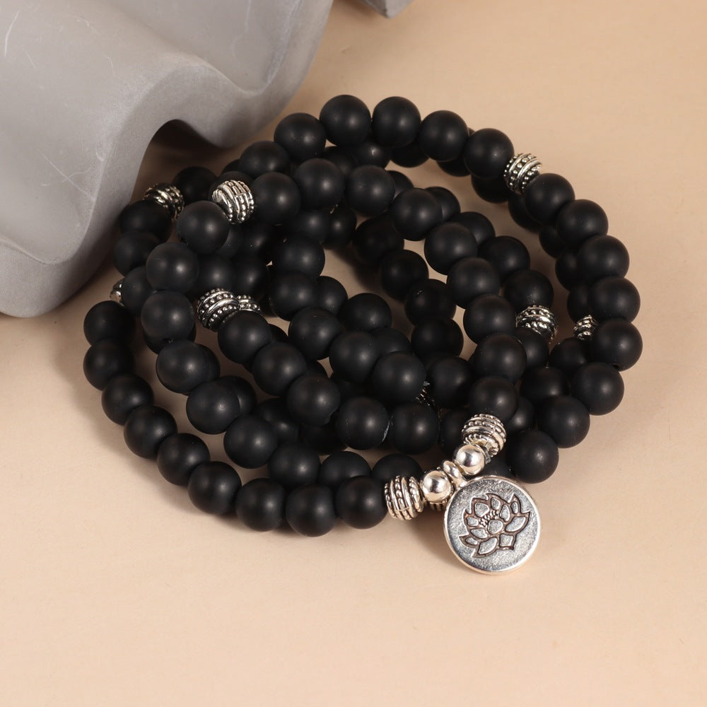 Matte Black Onyx Lotus beaded Necklace 108 Beads Design - Lifestyle image | AnwenYing Jewelry